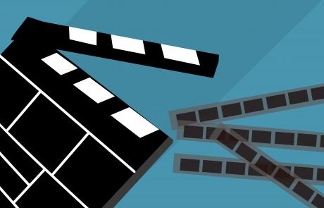 klaps filmowy i taśma filmowa